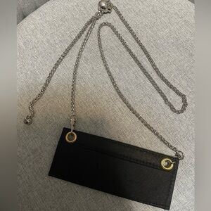 Black insert with silver adjustment chain